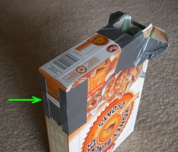 my cereal box spectroscope (arrow: the slit)